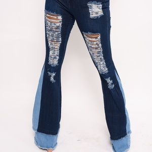 Two tone bell bottom distressed jeans